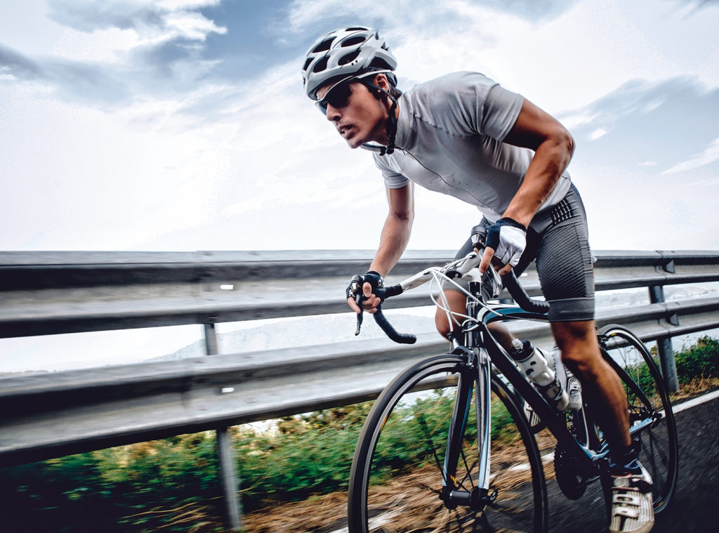 stock-photo-cyclist-in-maximum-effort-in-a-road-outdoors-266933141